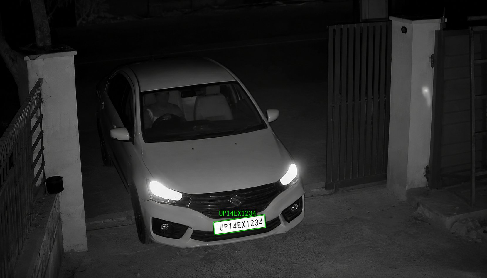 ANPR system recognizing license plate UP14EX1234 on a vehicle at night via CCTV