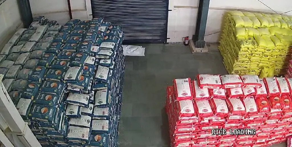 Warehouse CCTV view of stacked bags of different types